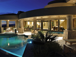 A circular &ldquo;floating&rdquo; dining room in Scottsdale (Fairway 8) benefits from the flicker and drama of water, day, and night.