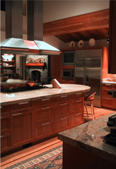 A large professional kitchen in Wyoming designed to be both residential in warmth, and functional as a hub for 3 to 4 kitchen staff frequently on hand. 